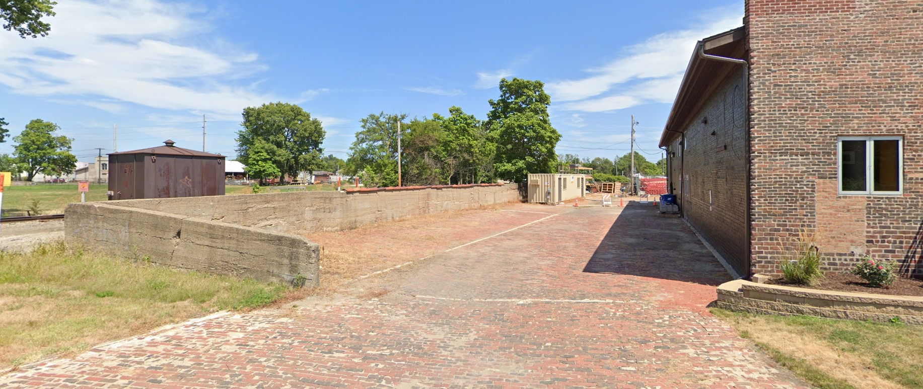 Image of a brick surface that is the location of a public right-of-way, but it is being used as private property