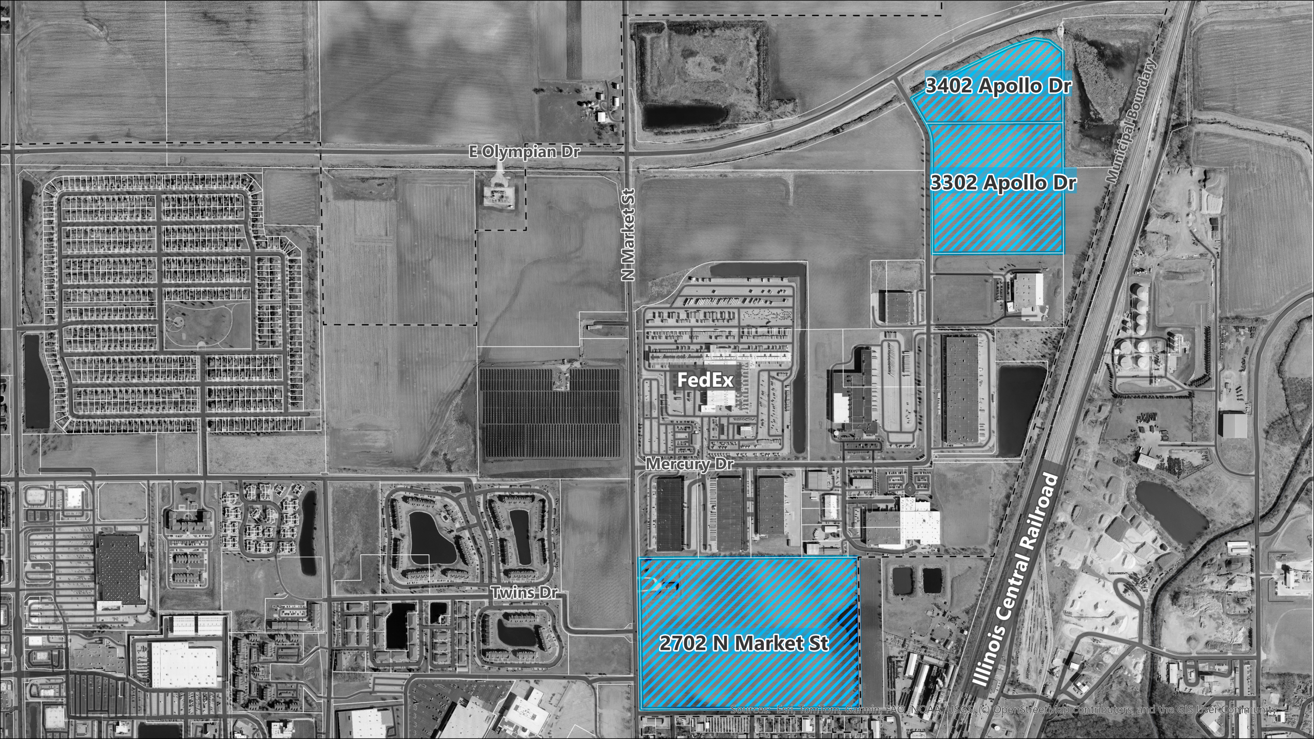 The properties to be rezoned are highlighted in blue on a map of the northeastern industrial part of the City of Champaign. The two Apollo tracts are contiguous and lie south of Olympian Drive, east of Apollo Drive, and west of the Illinois Central Railroad. The Market Street property lies east of Market Street and south of Mercury Drive. FedEx is nearby the subject properties.