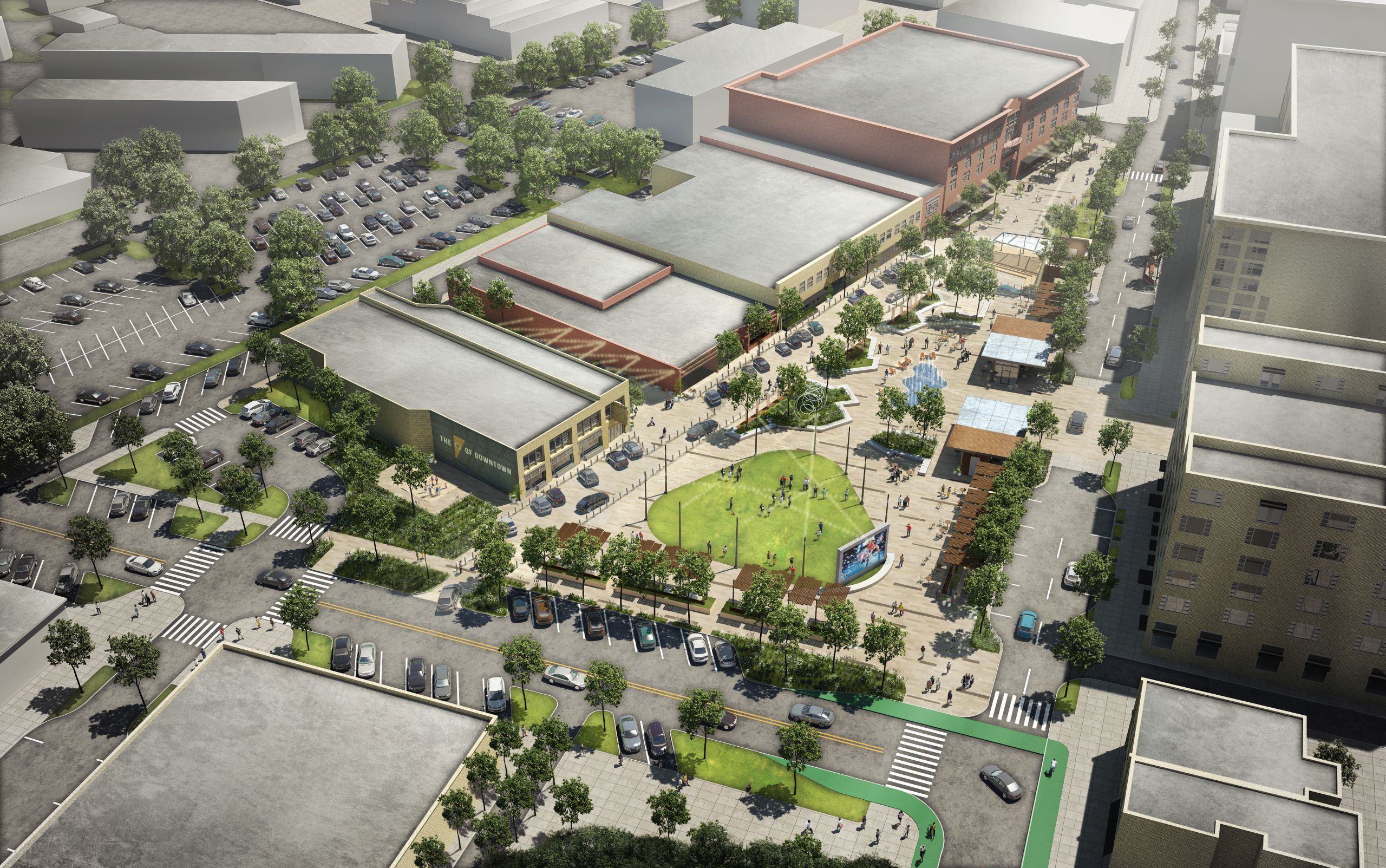 A rendering of the Downtown Plaza from a bird's eye view perspective facing south from Neil and Washington. Design elements such as landscaping, business kiosks, a stage, curbless street, and the lot south of the Orpheum are shown as they may be constructed.
